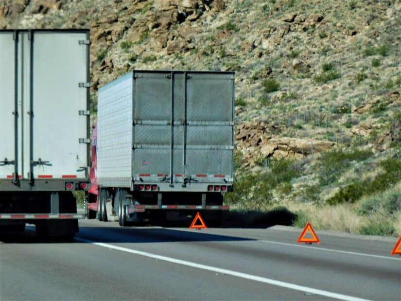 Car accident scene with damaged vehicles and emergency response showing steps for injury claim and legal rights