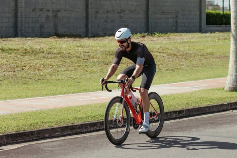 Cyclist wearing helmet and safety gear highlighting prevention of bicycle accident injuries in Greenville SC