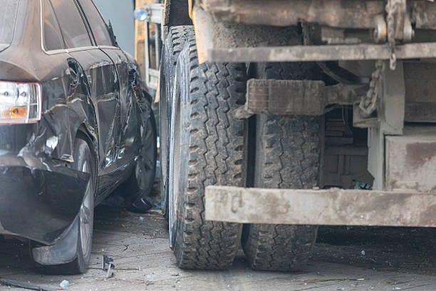 sue a truck company for damaging your car in Greenville, SC