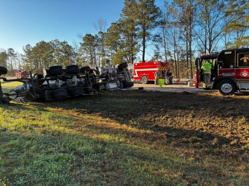 Overturned tractor-trailer crash on Highway 9 in Horry County with emergency crews and fire trucks responding at the scene