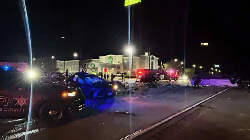 3 car accident in Macon GA on Riverside Drive with overturned truck and emergency response at crash scene