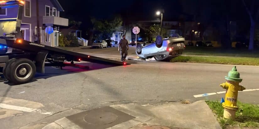 Rollover car crash at Jefferson Street and Anderson Street in Savannah Georgia causing traffic disruption and emergency response crews at the scene